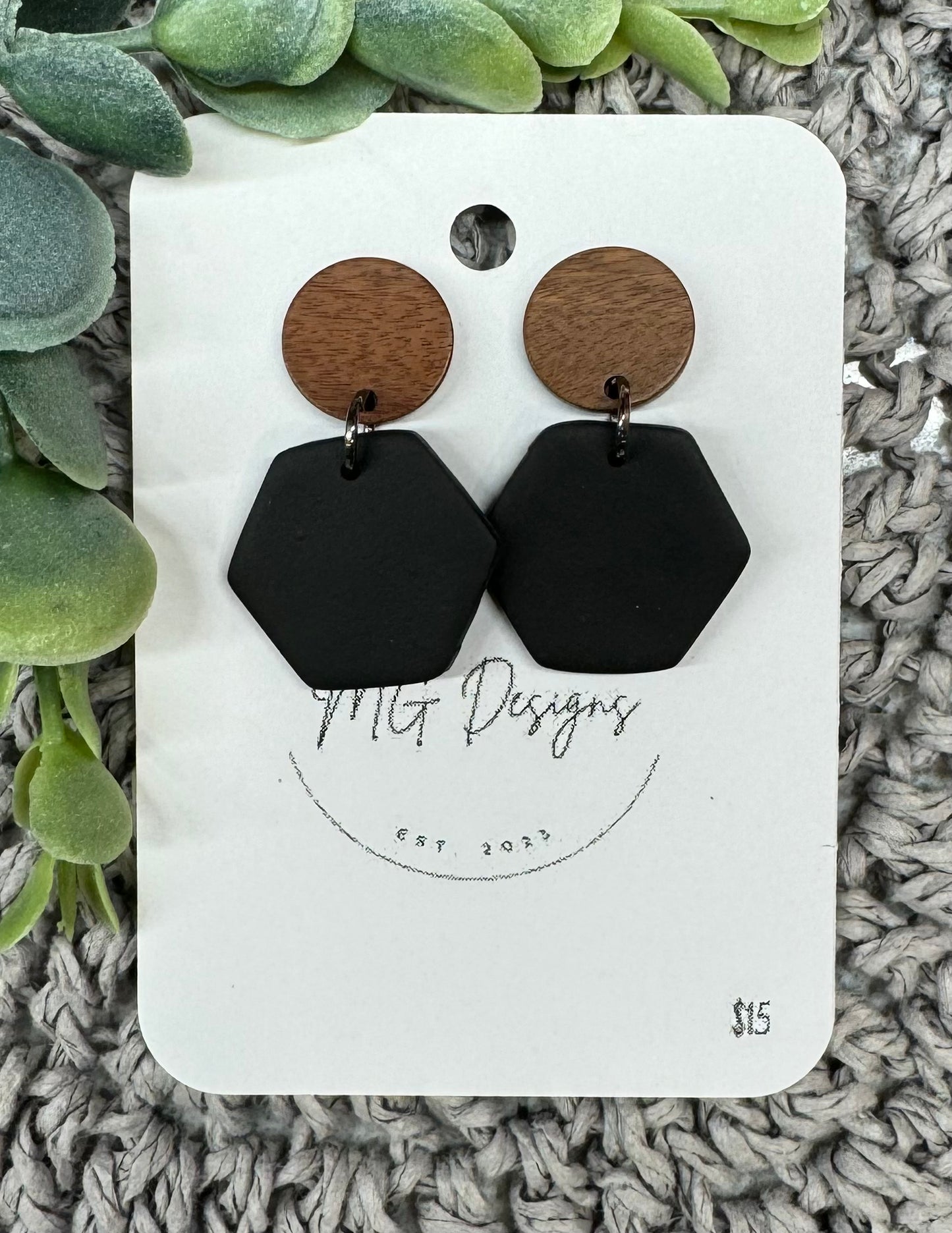 Wood circle with black hexagon